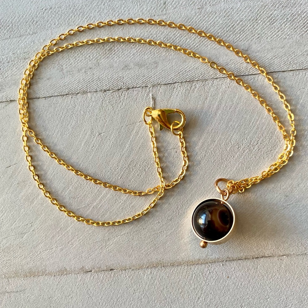 Brown ball pendant, spinning pendant